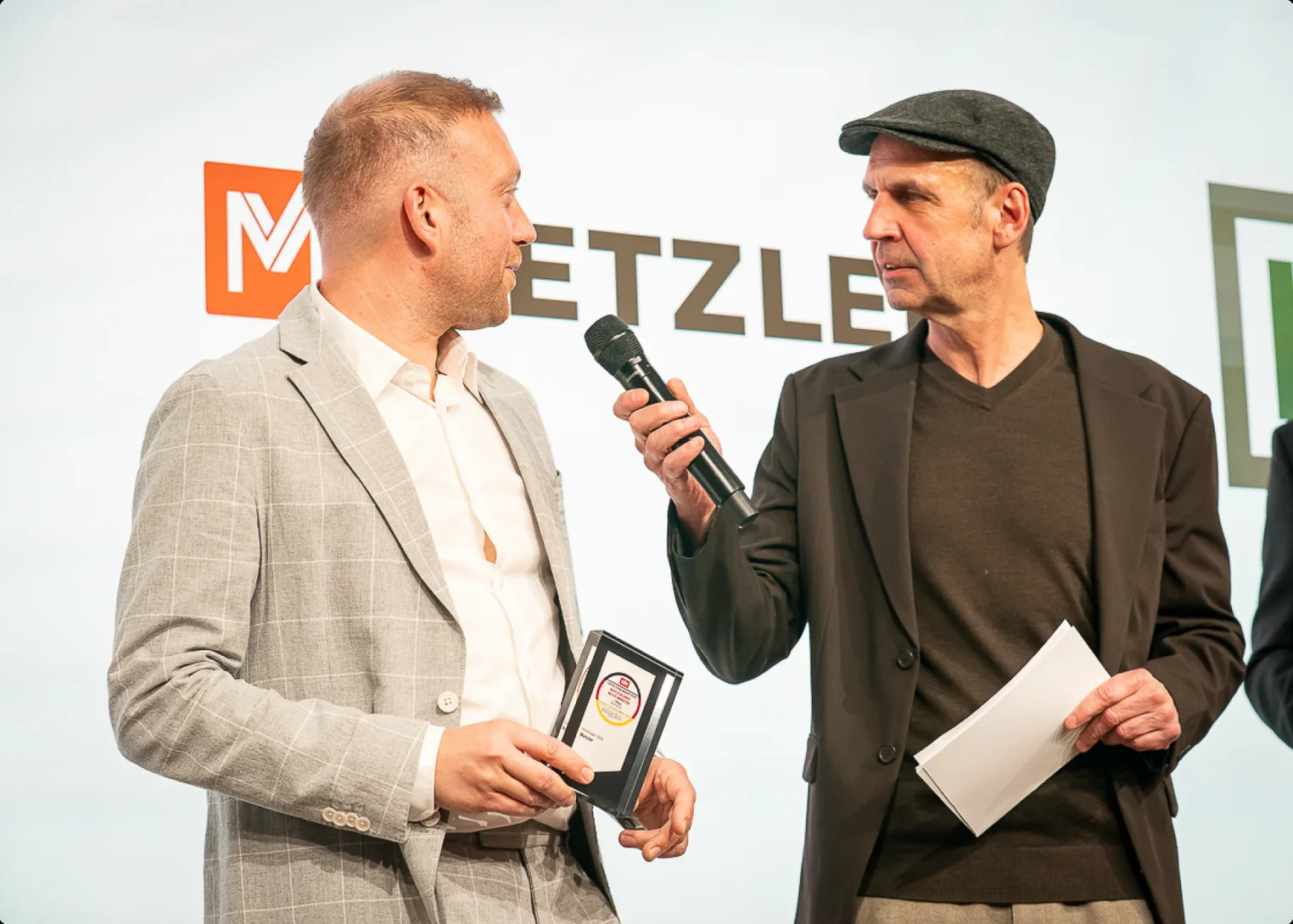 Metzler-Vertreter mit der Auszeichnung im Interview